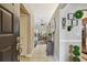 Stylish entryway showcasing tile flooring, decorative accents, and a glimpse into the living area at 1801 E Lake Rd # 20 G, Palm Harbor, FL 34685