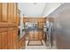 The kitchen features stainless steel appliances, granite countertops, and plenty of wooden cabinet space at 1801 E Lake Rd # 20 G, Palm Harbor, FL 34685
