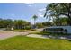 Inviting community entrance with landscaped median and clear signage for Cypress Trace North at 1854 Lake Cypress Dr # 1854, Safety Harbor, FL 34695