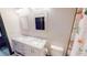 Bright bathroom with white double vanity, marble countertop, and modern fixtures at 20023 Pergola Bend Ln, Tampa, FL 33647