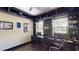 A home office that is complete with built-in shelving, storage and windows at 20023 Pergola Bend Ln, Tampa, FL 33647