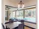 Dining area view of a lovely lanai, complete with an inground pool, spa, and outdoor seating at 20023 Pergola Bend Ln, Tampa, FL 33647
