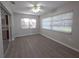 Bright sunroom with modern floors and lots of natural light at 2045 Summit Dr, Dunedin, FL 34698