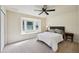 Bright bedroom with a bay window, providing natural light and a cozy ambiance at 25238 Bunting Cir, Land O Lakes, FL 34639