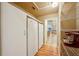 Large pantry with shelving and an extra refrigerator for plenty of storage at 25238 Bunting Cir, Land O Lakes, FL 34639
