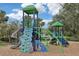 Community playground with climbing structures, slides, and a soft landing surface for safe play at 27209 Firebush Dr, Wesley Chapel, FL 33544