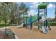 Fun playground with colorful equipment and a wood chip surface in a great neighborhood at 27209 Firebush Dr, Wesley Chapel, FL 33544