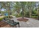 Scenic walking path winds through lush landscaping, connecting residents to the community playground at 27209 Firebush Dr, Wesley Chapel, FL 33544