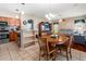 Open concept features a spacious kitchen that overlooks the living area and dining area at 28390 Openfield Loop, Wesley Chapel, FL 33543