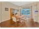 Bright dining area with sliding glass doors offering a view of the pool at 2847 Mossy Timber Trl, Valrico, FL 33596