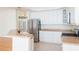 Kitchen view featuring the stainless steel refrigerator and white cabinets with stainless appliances at 2876 Bayshore Trails Dr, Tampa, FL 33611