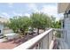 Balcony view of the brick paved street and tree lined sidewalks of the neighborhood at 2876 Bayshore Trails Dr, Tampa, FL 33611