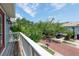 Balcony view of the brick paved street with neighborhood landscaping at 2876 Bayshore Trails Dr, Tampa, FL 33611