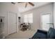 Bright bedroom with a ceiling fan, closet, and access to laundry at 3053 Pointeview Dr, Tampa, FL 33611
