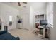 Bright bedroom with a ceiling fan, closet, and access to laundry at 3053 Pointeview Dr, Tampa, FL 33611