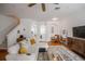 Cozy living room with modern furniture, hardwood floors and area rug, creating a comfortable and stylish space at 3053 Pointeview Dr, Tampa, FL 33611