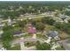 Panoramic aerial view showcasing a single-Gathering home within a serene and verdant neighborhood at 3509 King George Ln, Seffner, FL 33584