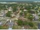 Wide aerial shot of a residential neighborhood, displaying the community's layout and streetscape at 3509 King George Ln, Seffner, FL 33584