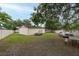 Spacious backyard featuring a large garage and car parking, with ample parking and room for outdoor activities at 3509 King George Ln, Seffner, FL 33584