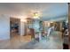 Bright dining room with glass table, ceiling fan, and lots of natural light at 3509 King George Ln, Seffner, FL 33584