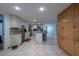 Large kitchen featuring an island, granite countertops, and ample cabinet space at 3509 King George Ln, Seffner, FL 33584