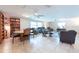 Comfortable living room with a view of the well-lit sitting area and the dining area at 3509 King George Ln, Seffner, FL 33584