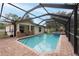 Screened in pool with covered patio perfect for hot summer days at 3509 King George Ln, Seffner, FL 33584
