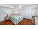 Bedroom with wooden floors, ample built-in storage, and neutral decor at 4154 56Th N St # 720, Kenneth City, FL 33709