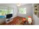 Bright living room area featuring wood floors, natural light and neutral color palette at 4154 56Th N St # 720, Kenneth City, FL 33709