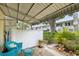 Outdoor patio featuring brick flooring with views of landscaping at 4154 56Th N St # 720, Kenneth City, FL 33709