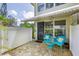 Private patio area with brick flooring and seating surrounded by lush greenery at 4154 56Th N St # 720, Kenneth City, FL 33709