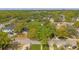 Aerial view of a neighborhood with lush greenery and well-maintained homes at 4309 W Empedrado St, Tampa, FL 33629