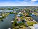 An aerial perspective captures a scenic waterfront neighborhood with convenient access to the open water at 4523 Gulfstream Dr, Hernando Beach, FL 34607