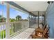 Screened porch with waterfront views, perfect for relaxing and enjoying the outdoors at 4523 Gulfstream Dr, Hernando Beach, FL 34607