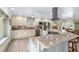 Spacious kitchen with granite countertops, stainless steel appliances, and modern fixtures at 4523 Gulfstream Dr, Hernando Beach, FL 34607
