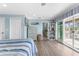 Light-filled main bedroom with walk-out, closet, and bathroom at 4523 Gulfstream Dr, Hernando Beach, FL 34607