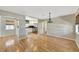Open dining area leading to a modernized kitchen, seamlessly blending living and cooking spaces at 4619 W Bay Villa Ave, Tampa, FL 33611