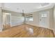 Bright entryway boasting hardwood floors, and a decorative glass front door, and fresh neutral paint at 4619 W Bay Villa Ave, Tampa, FL 33611