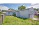 View of the backyard and exterior of the property showing an enclosed area and a partial fence at 5048 5Th S Ave, St Petersburg, FL 33707