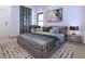 Comfortable bedroom with modern decor, neutral tones, and stylish lighting at 5200 7Th N Ave, St Petersburg, FL 33710
