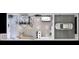 Open-concept floor plan with living, dining, kitchen, and garage layout, showcasing functionality at 5200 7Th N Ave, St Petersburg, FL 33710