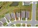 Aerial view highlighting the home's position on a lot with a red outline showcasing property lines and backyard at 5214 Granite Dust Pl, Palmetto, FL 34221