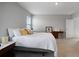 Cozy bedroom with soft lighting, comfortable bedding, and classic furnishings for a relaxing retreat at 5214 Granite Dust Pl, Palmetto, FL 34221
