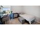 Functional bedroom with desk space, a cozy bed, and neutral tones, ideal for study and rest at 5214 Granite Dust Pl, Palmetto, FL 34221