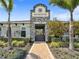Silverstone entrance features a stone sign, manicured landscaping, flowers and a brick-paved path at 5214 Granite Dust Pl, Palmetto, FL 34221