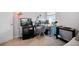 Modern office with multiple monitors, a stylish desk setup, and vibrant lighting, creating a creative workspace at 5214 Granite Dust Pl, Palmetto, FL 34221