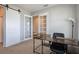 Bright home office with large desk, ample storage, and natural light, creating an inspiring workspace at 5214 Granite Dust Pl, Palmetto, FL 34221