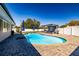 Backyard pool with a brick patio and an outdoor living area at 5509 Bluejay Ln, Tampa, FL 33625