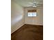Cozy bedroom featuring carpet, ceiling fan and a window at 6324 Newtown Cir # 24B2, Tampa, FL 33615