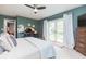 Beautiful main bedroom with an attached office space and backyard access through French doors at 6412 S Richard Ave, Tampa, FL 33616